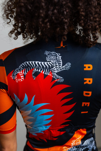 Close-up of jersey back with ARDEI logo and red floral design