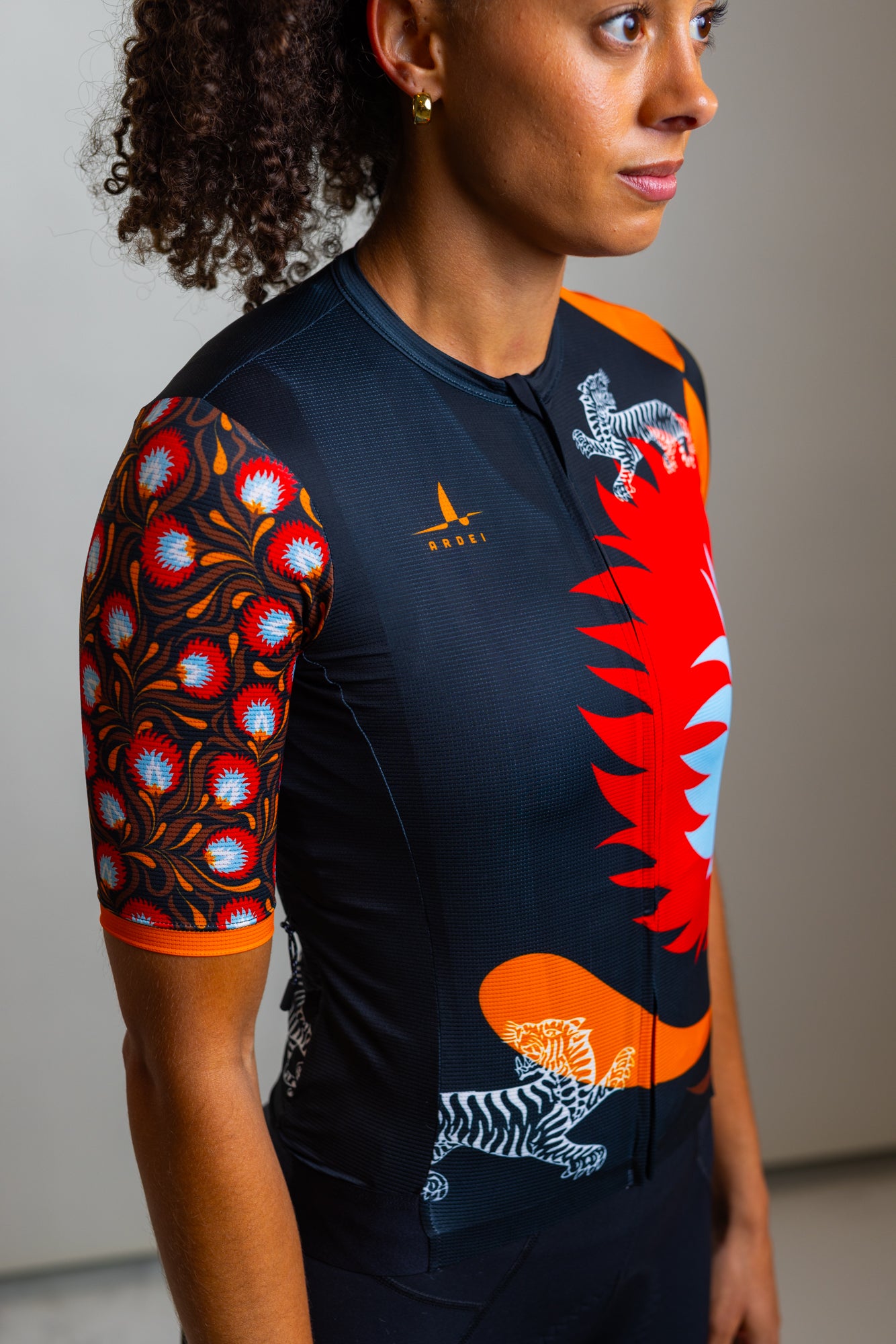Side view showing sleeve floral pattern and jersey fit